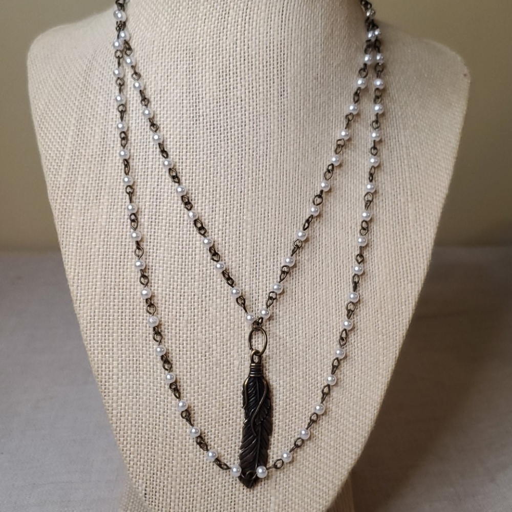 Double bronze and pearl necklace w/ feather charm